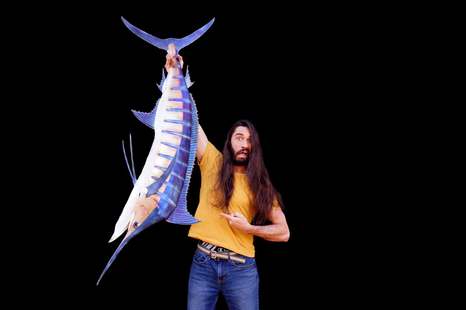 Artist Aiden Dale with stainless marlin sculpture