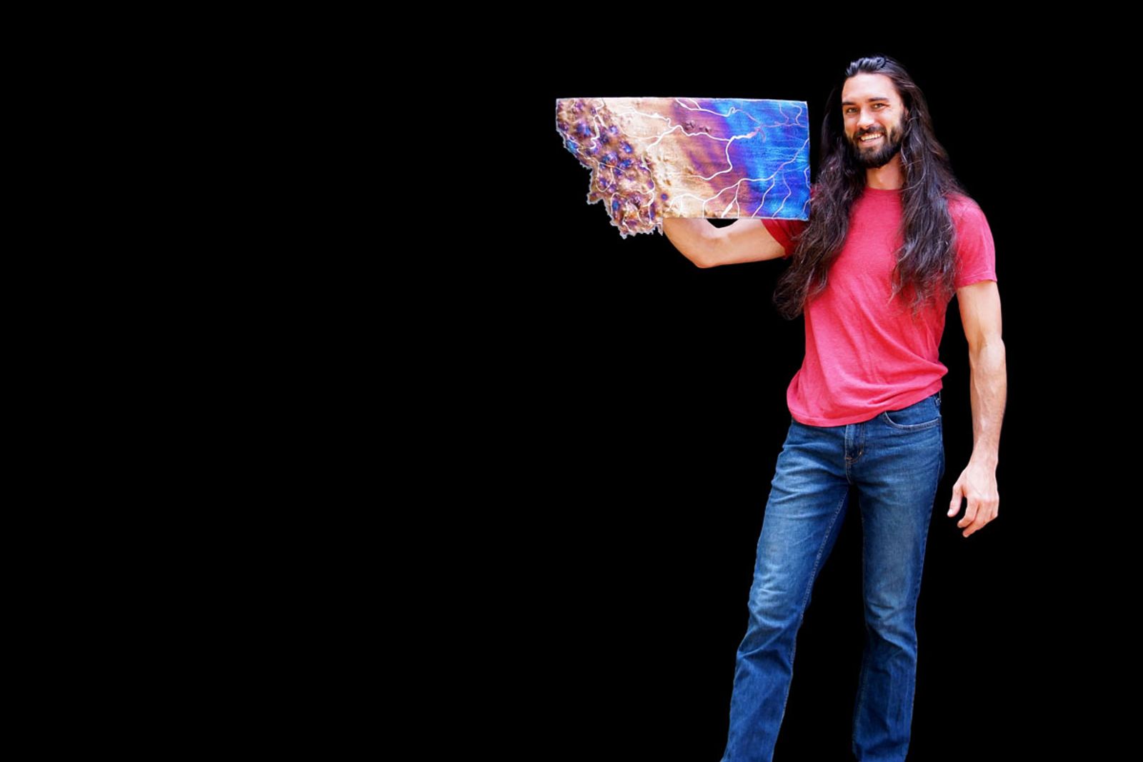 Artist Aiden Dale with small Montana map sculpture