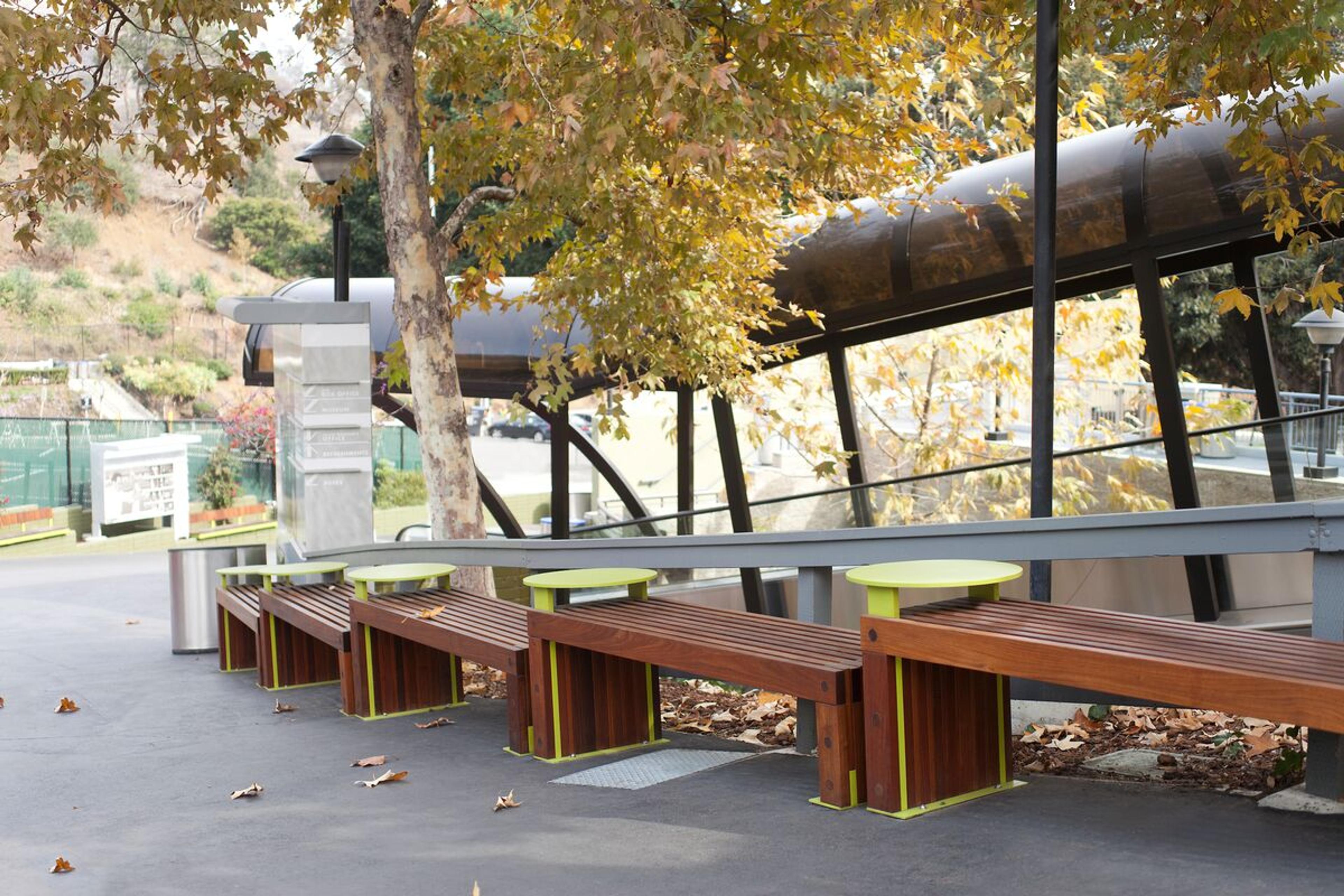 Custom seating with built-in tables • FSC® 100% Ipe hardwood bench slats • Corrosion-resistant powdercoated aluminum • Designed to parallel the slope of the Hollywood Bowl • Los Angeles, California