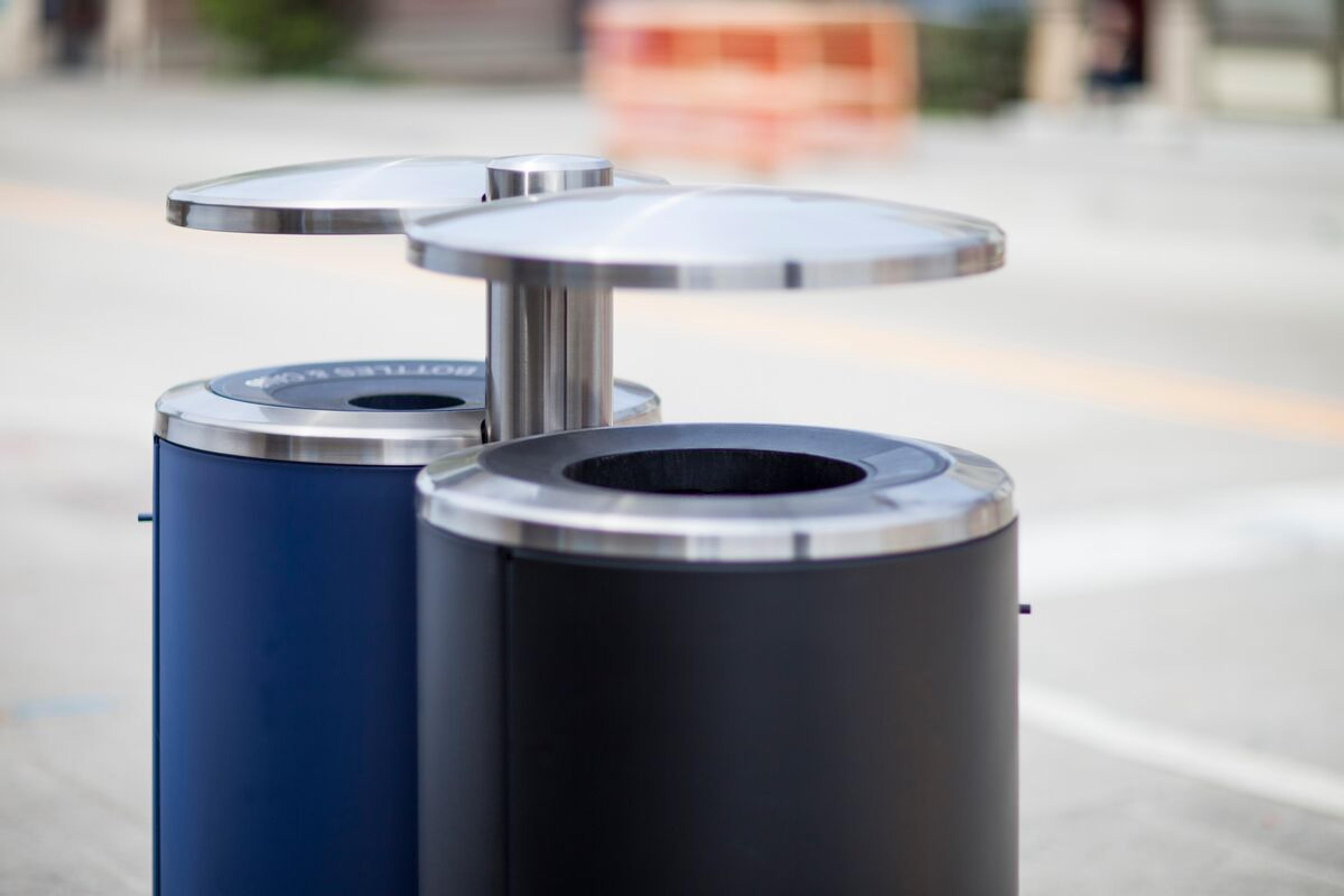 Custom stainless steel and aluminum receptacles keep waste in its place • Pole mount allows for easy walkway maintenance • Colors parallel the downtown streetscape • Pittsburgh, Pennsylvania