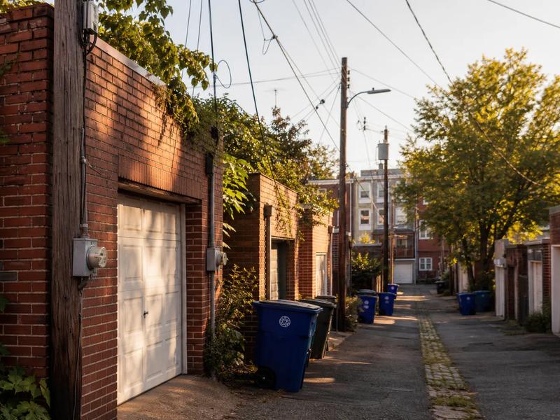 Washington, DC alley with Pepco lines and meters, illustrating 2026 rate changes