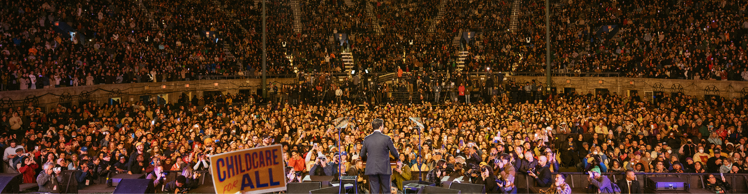Zohran Mamdani speaks at his rally at Forest Hills Stadium