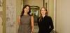 Mikaela Stafford and Kate Durman standing in the cloisters at the NFSA.