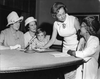Norma Ferris recording family members in the ABC’s Brisbane studio for 'Calling Antarctica’ 1965