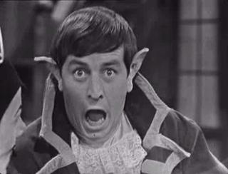 Screenshot of Ernie Sigley in The Story of Dick Whittington.