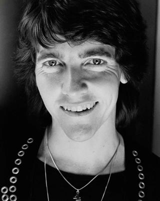 Singer-songwriter Jeff Phillips smiles for the camera in a promotional photo from 1978