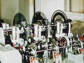 A Speaking Clock machine from the 1960s with large glass discs. 