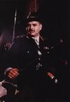 Hugh Keays-Byrne wearing a military uniform