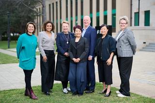 NFSA Board members standing on the lawn outside the NFSA building in Acton.