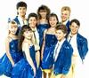 Members of the Young Talent Team wearing blue outfits.