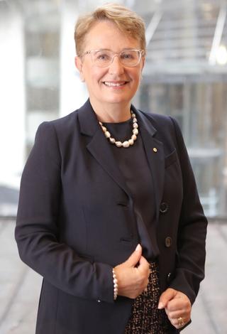 Portrait of NFSA Board member Lucinda Brodgen, smiling at the camera.