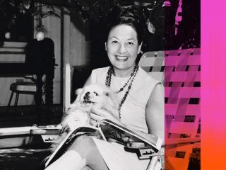 Radio personality Binny Lum sitting on a chair with a small dog in her lap.