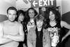 Four members of the Australian rock band Hoodoo Gurus pictured with US singer Suzi Quatro