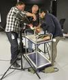 NFSA staff photographing the Kinora reel