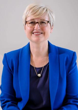 A headshot of NFSA Board member Carol Lilley