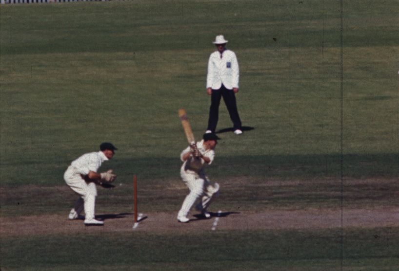 Frame capture of Don Bradman hitting a boundary.