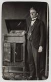Stuart Booty standing next to his Vitavox Gramophone