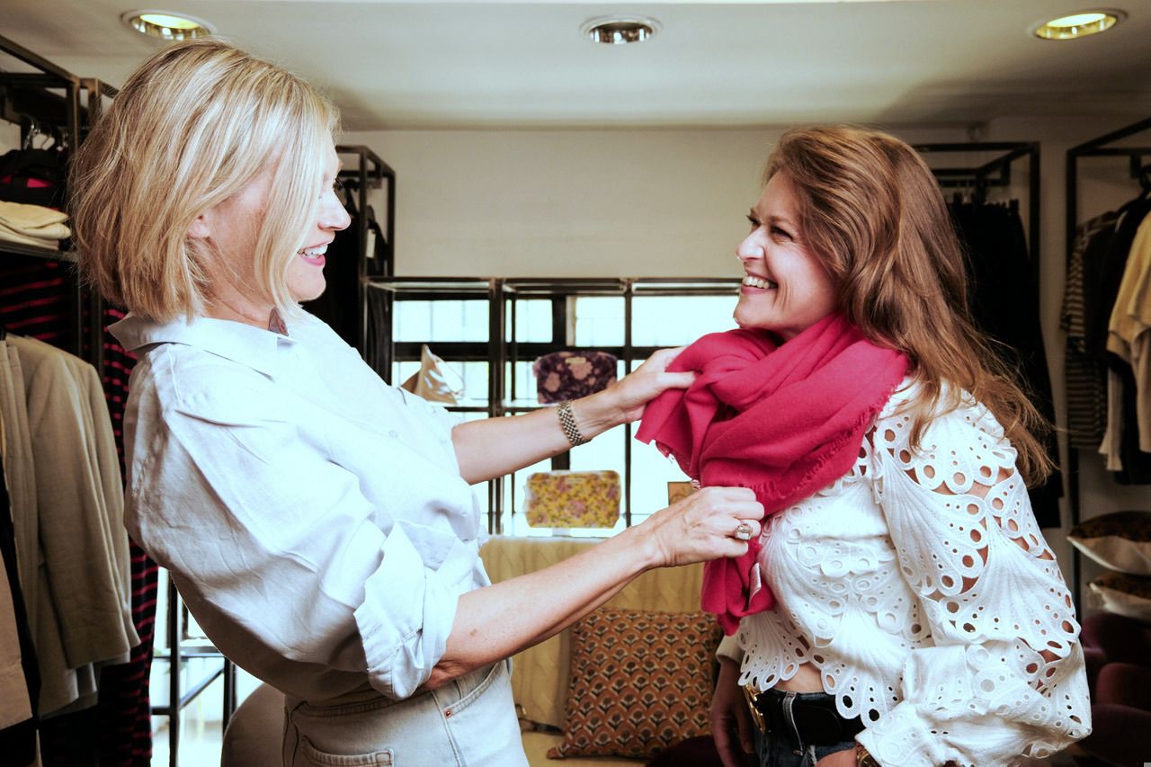 Beatrice laughing with a client during a styling session