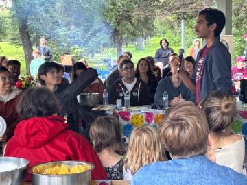 A participant recites a poem