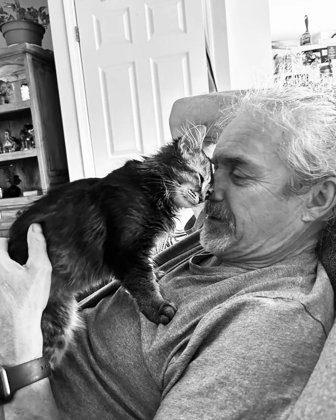 A picture of Glen and his cat