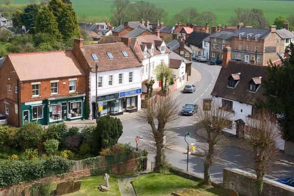 Looking out over the heart of Kineton from the historic St. Peter's Church, showing the layout of the village streets and local architecture.