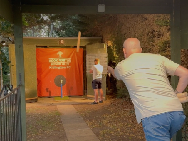 Mid throw during a game of Aunt Sally