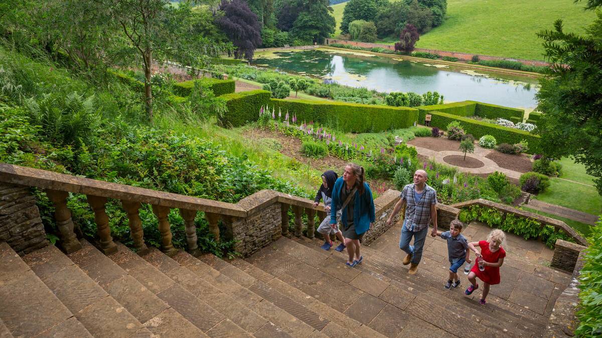 People climbing stairs at Upton House Gardens, Upton House