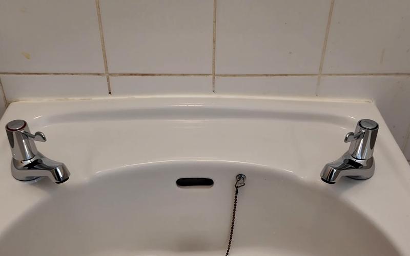 New hot and cold basin taps fitted and working.