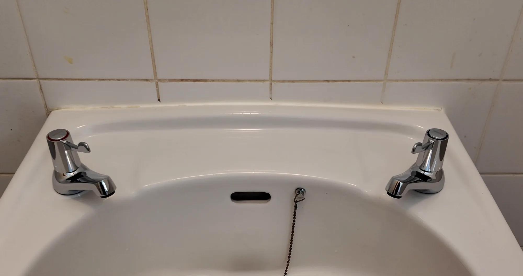 New hot and cold basin taps fitted and working.