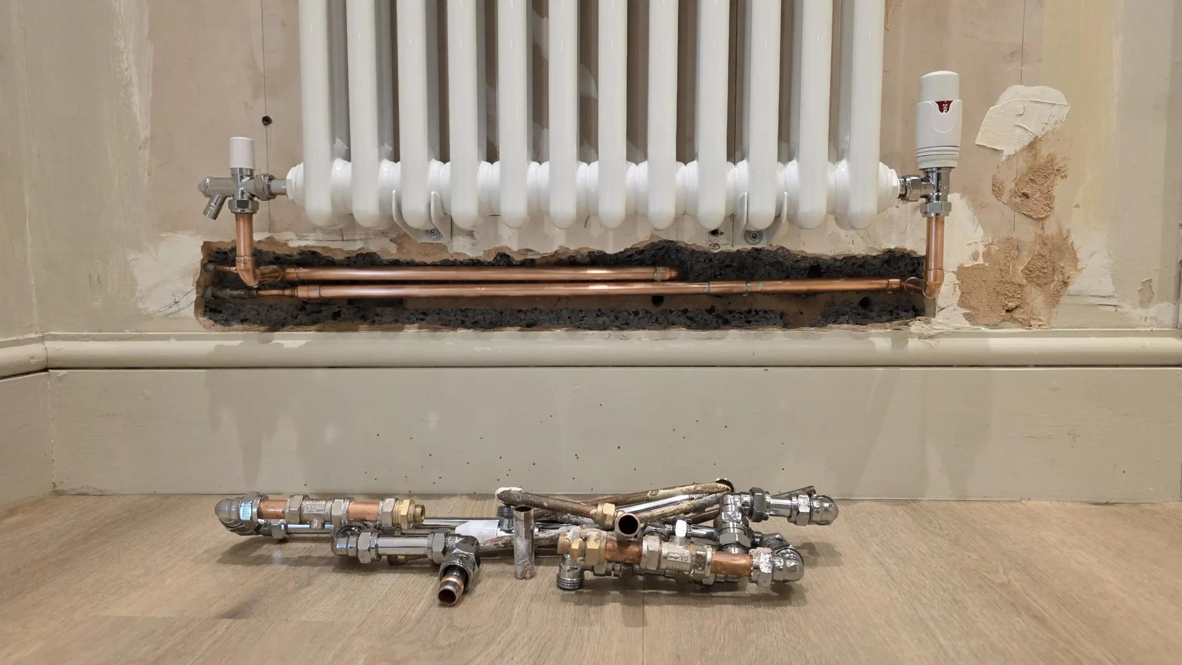Old pipework taken out from under a column radiator