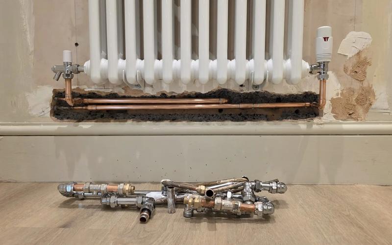 Old pipework taken out from under a column radiator