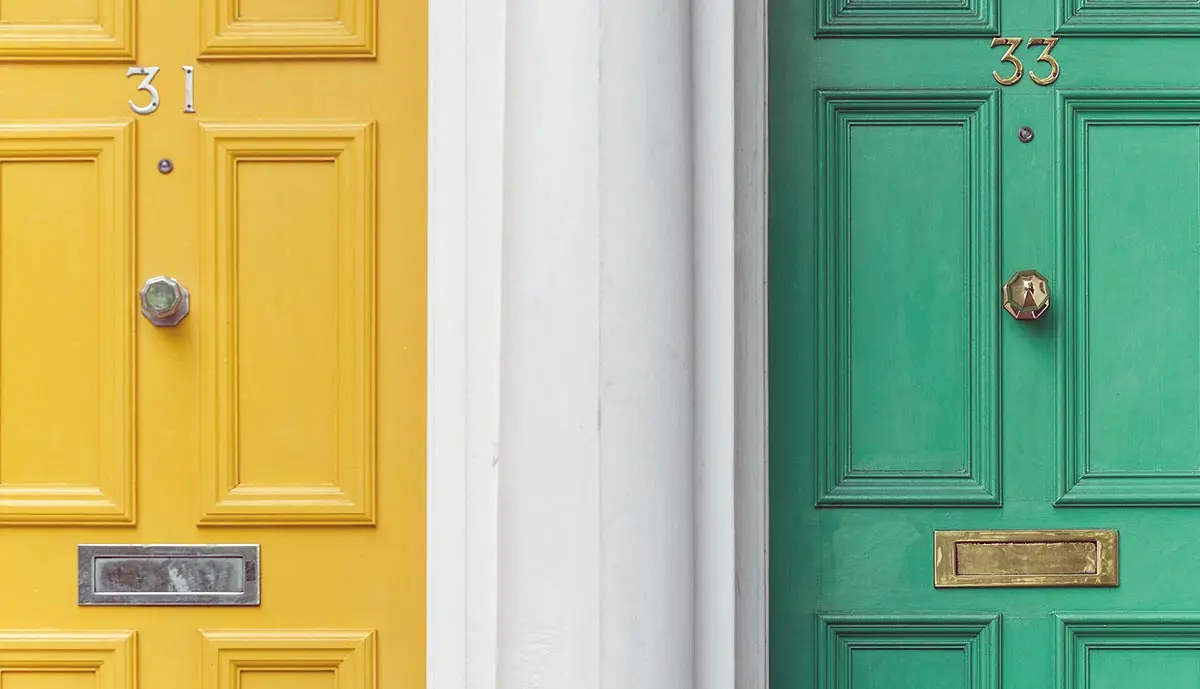 yellow and green doors neighbors