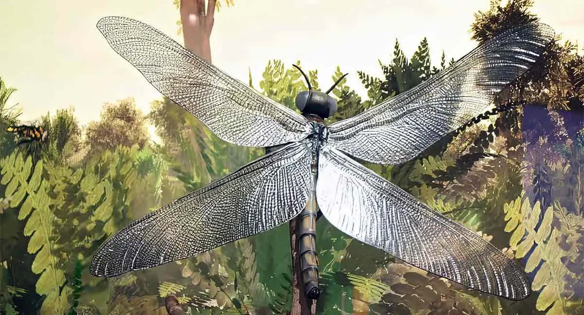 giant prehistoric dragonfly on tree