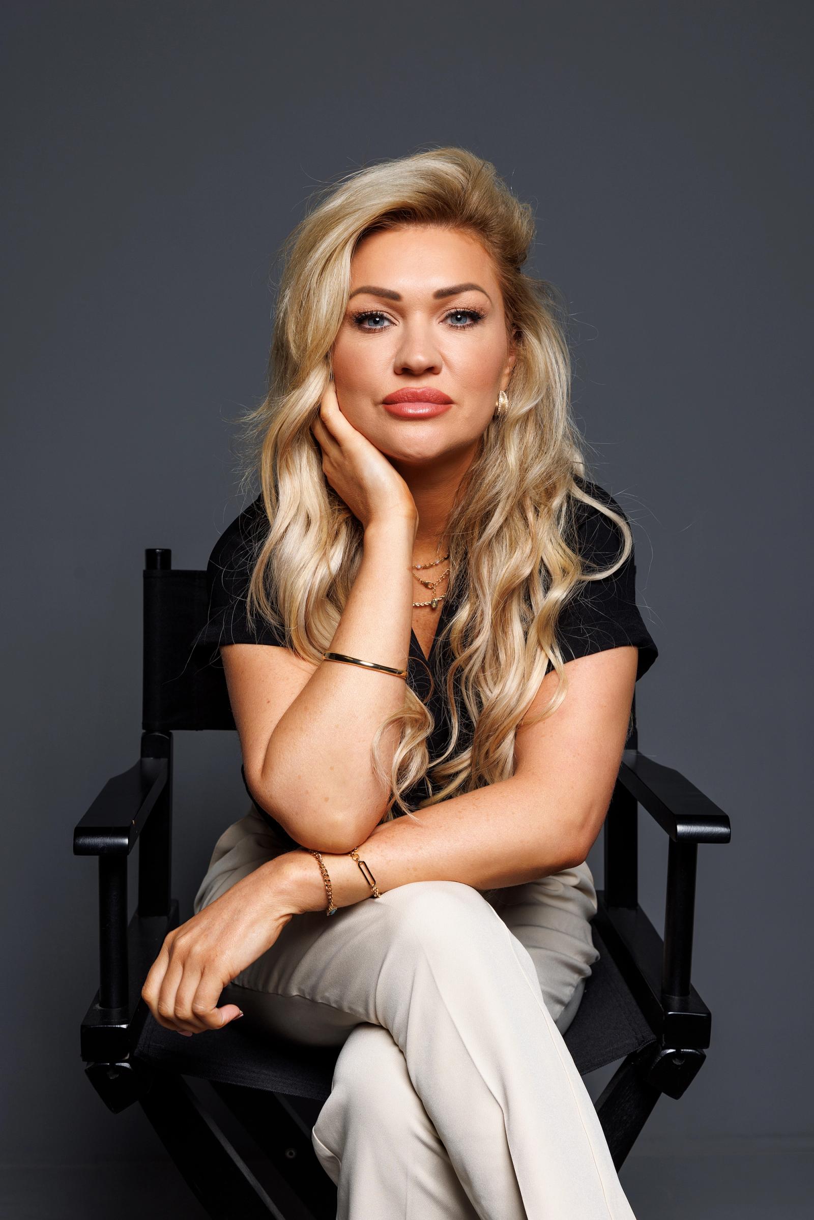blonde woman on chair
