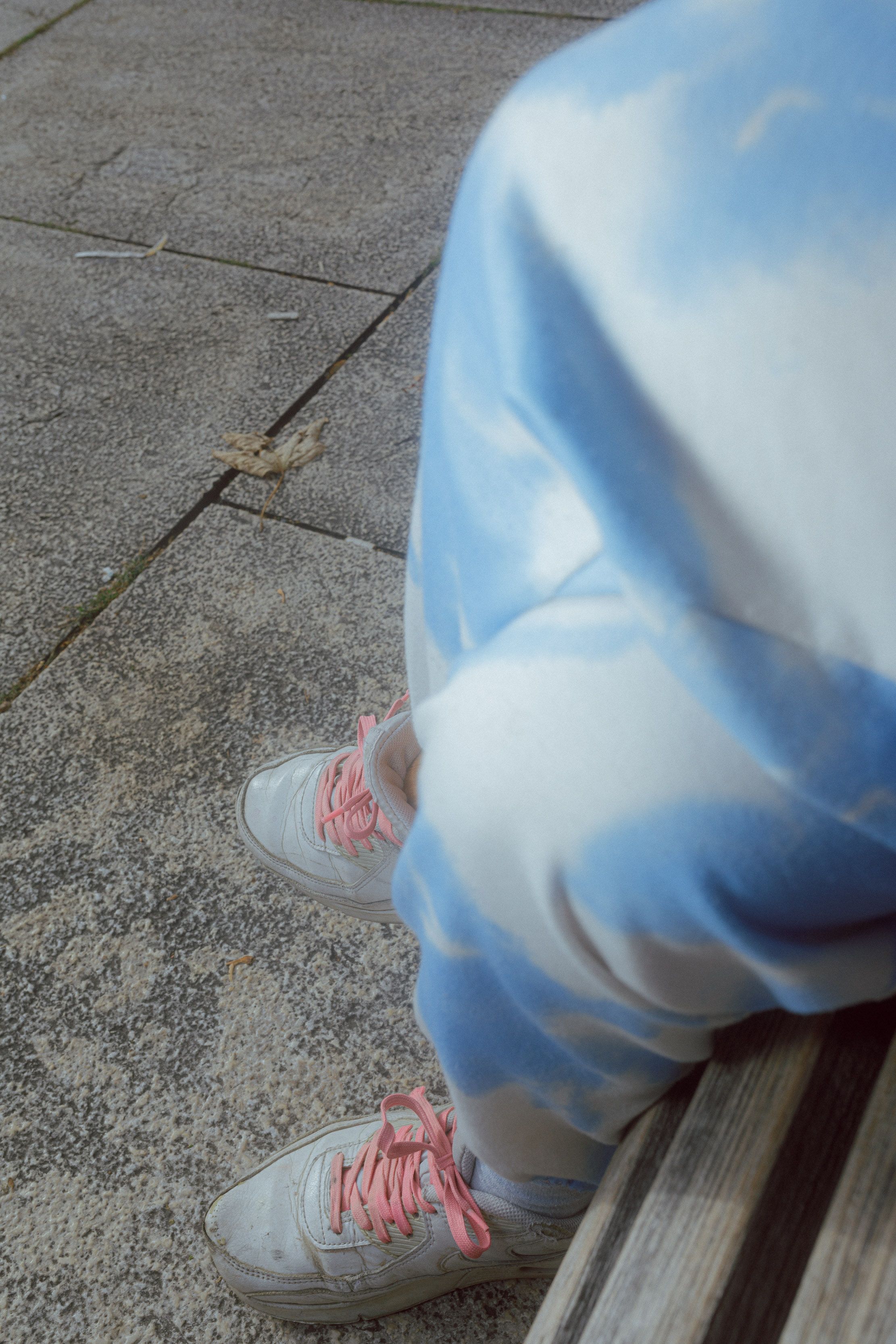 blue sky trousers pink shoelaces nonbinary vienna