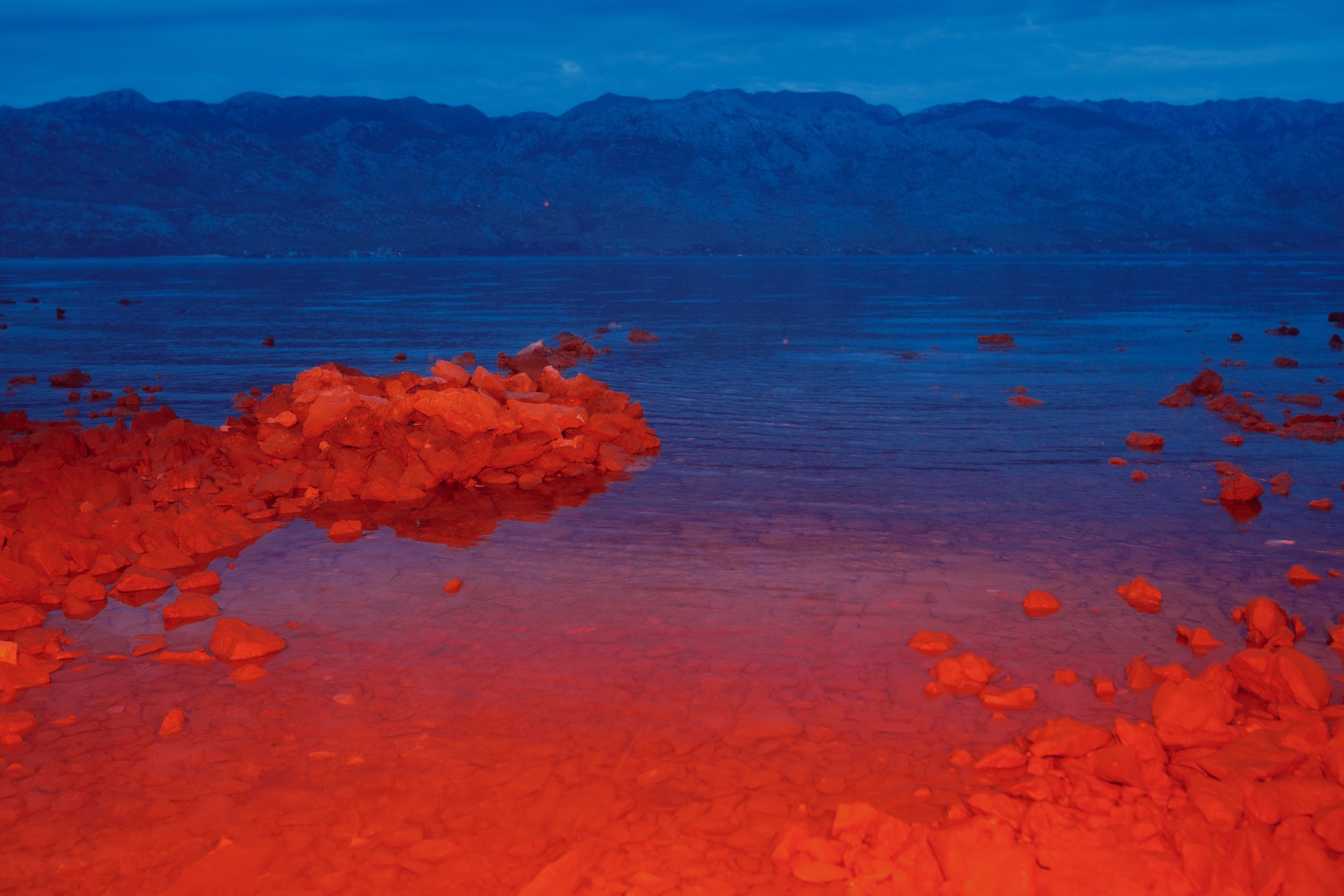 red stones blue sea velebit artistic photo