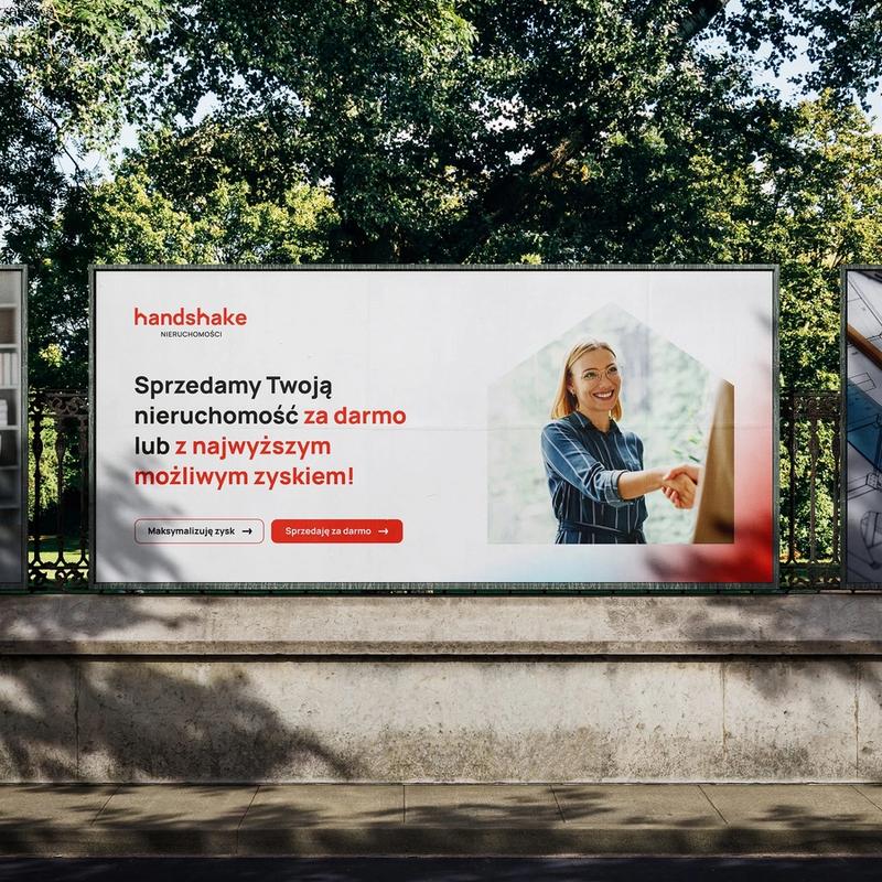 Bilbord Handshake z hasłem „Sprzedamy Twoją nieruchomość za darmo lub z najwyższym możliwym zyskiem!"