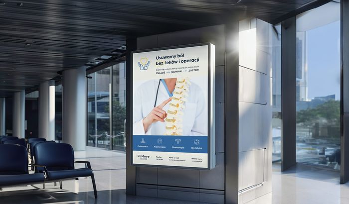 Plakat reklamowy ReMove Center w przestrzeni publicznej — hol biurowca