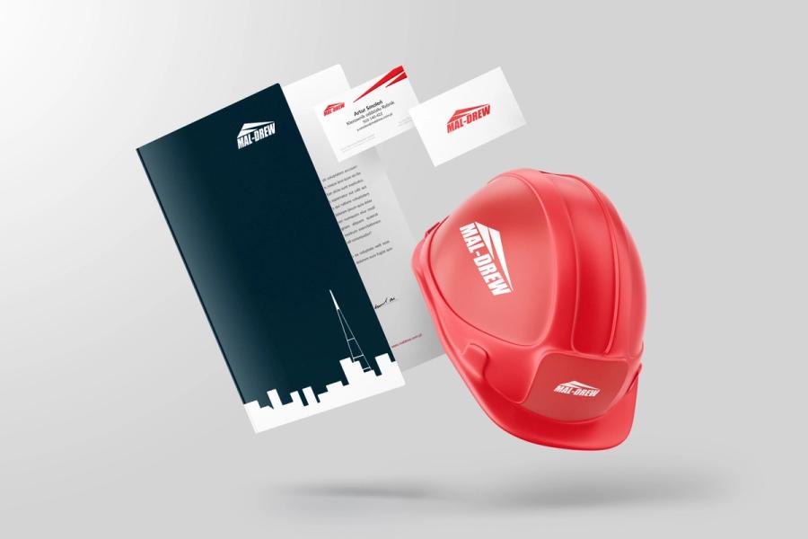 latająca teczka, wizytówki i kask z logo Mal-Drew