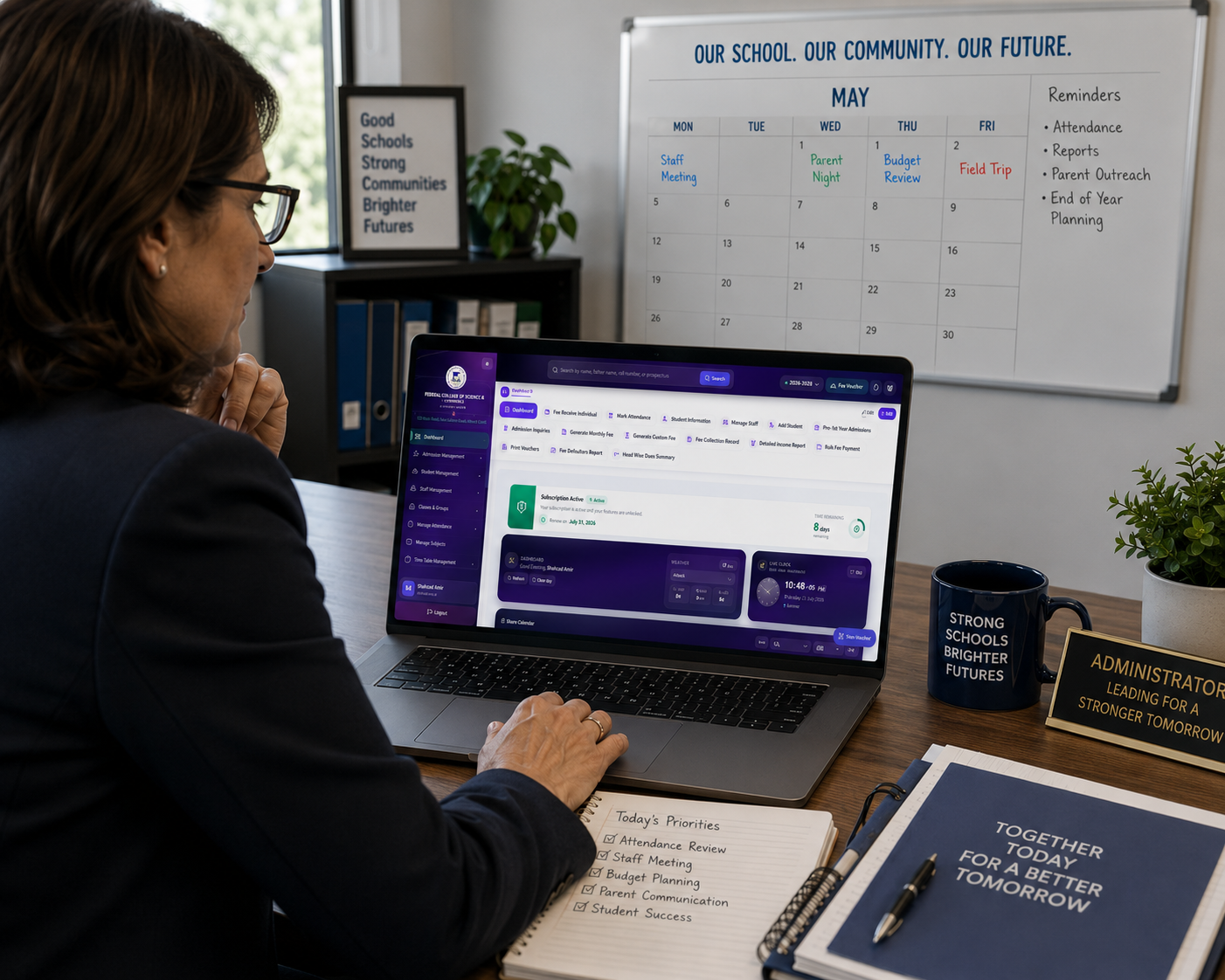 Administrator reviewing school management software dashboard on a laptop