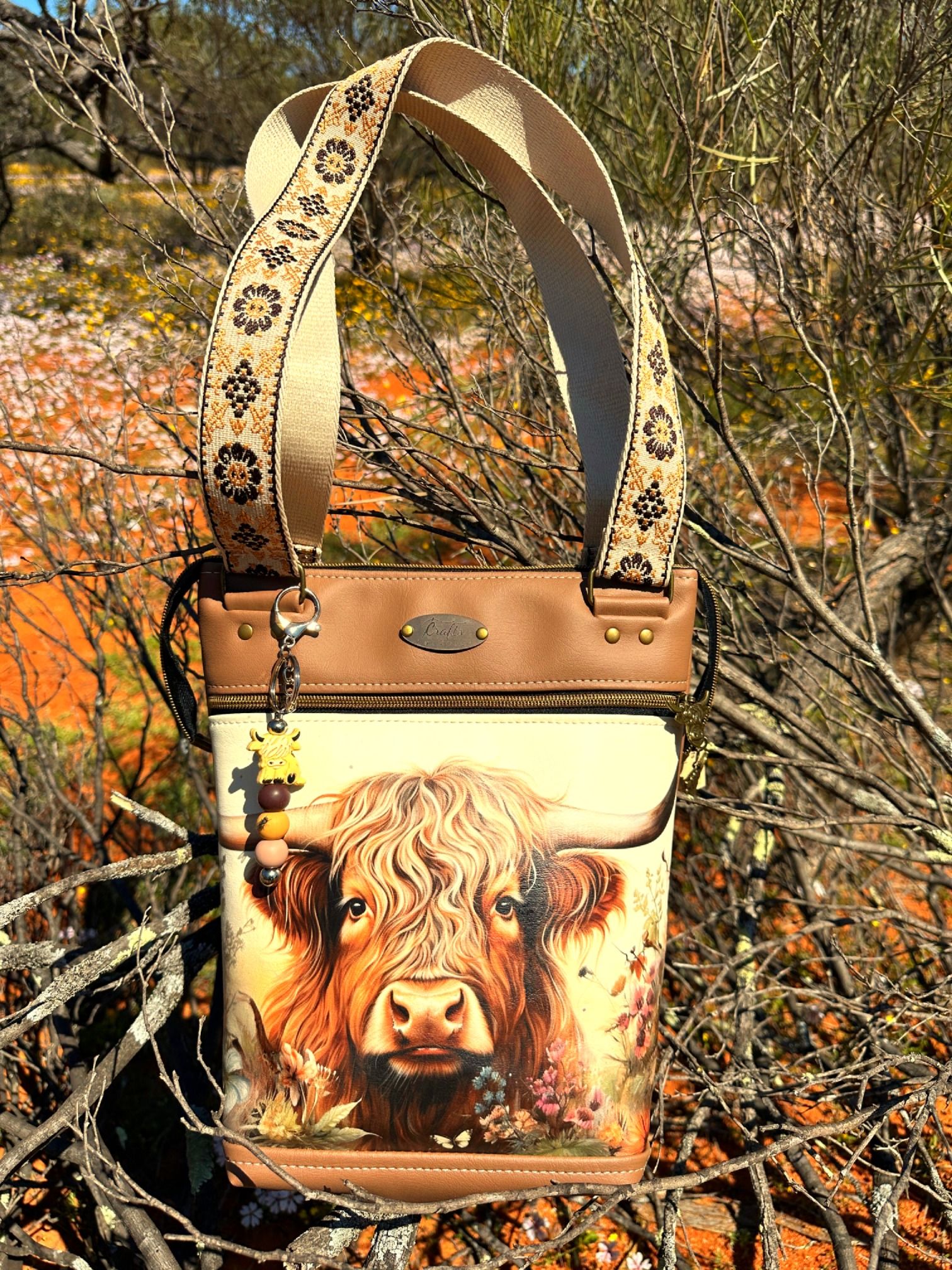 Tan shoulder bag with Highland Cow print