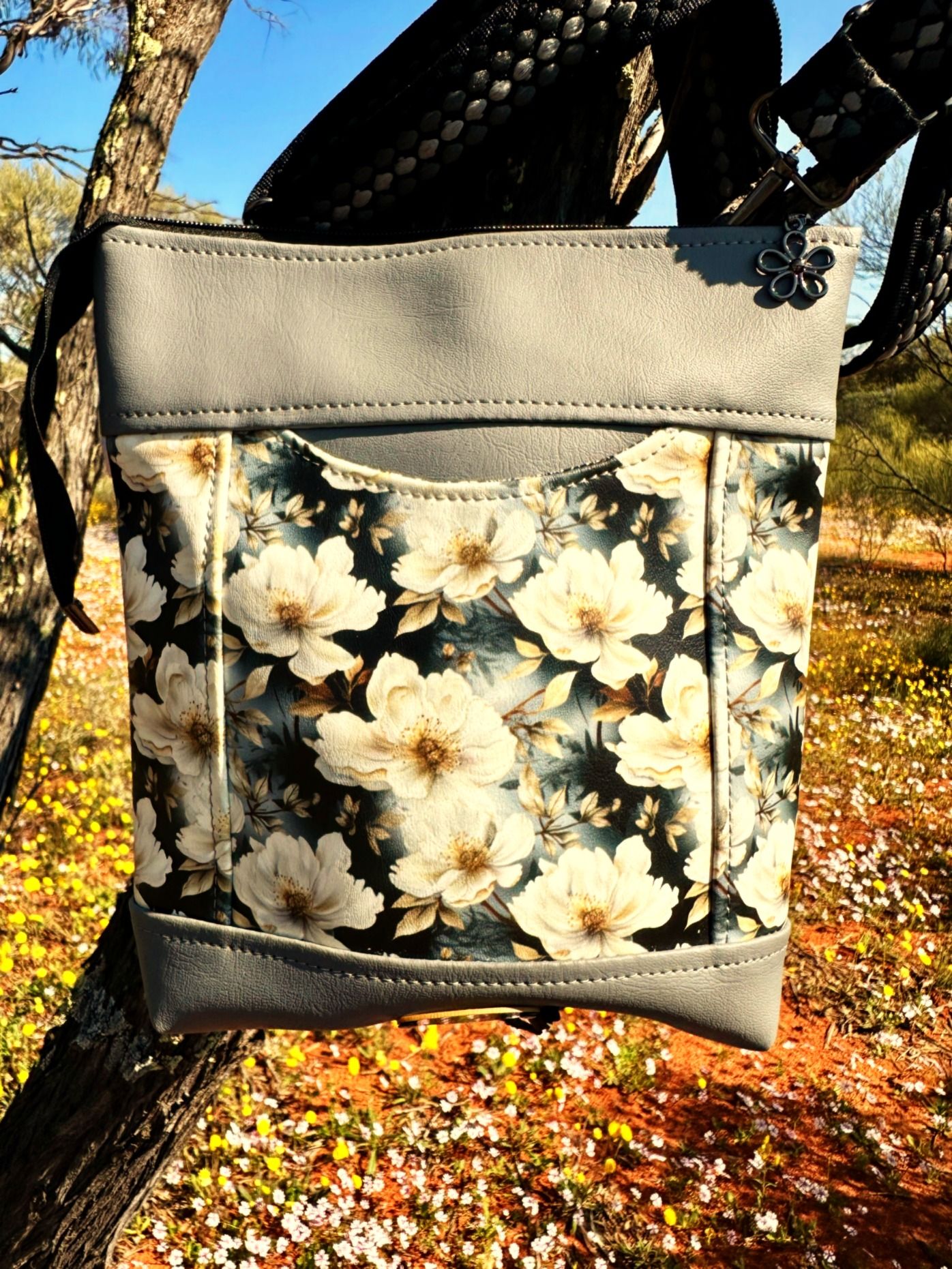 Light grey bag with floral print