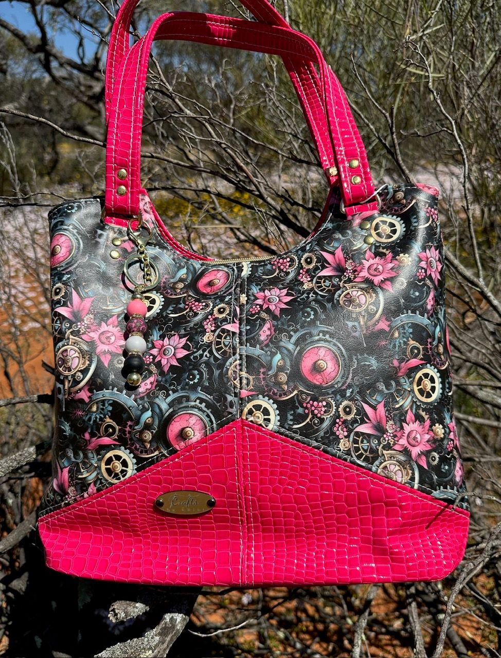 Red bag with surreal print