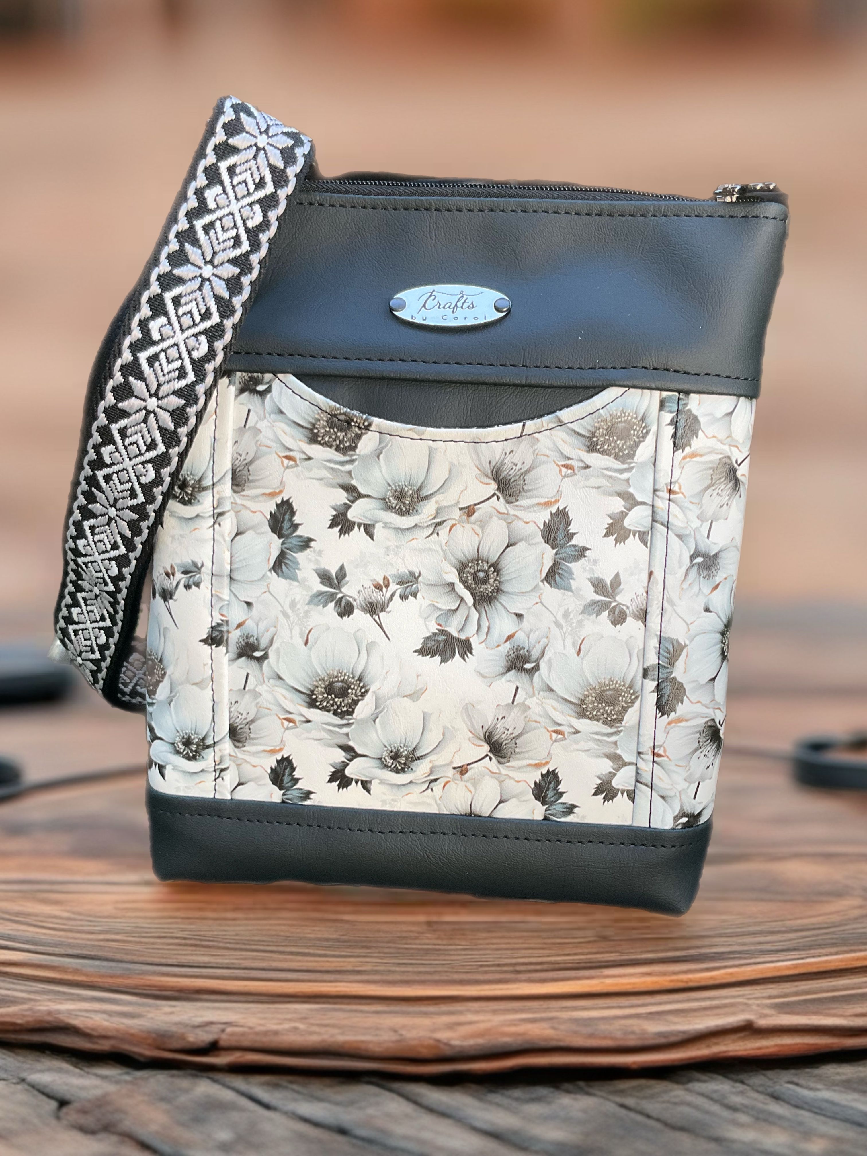 Dark grey bag with floral print