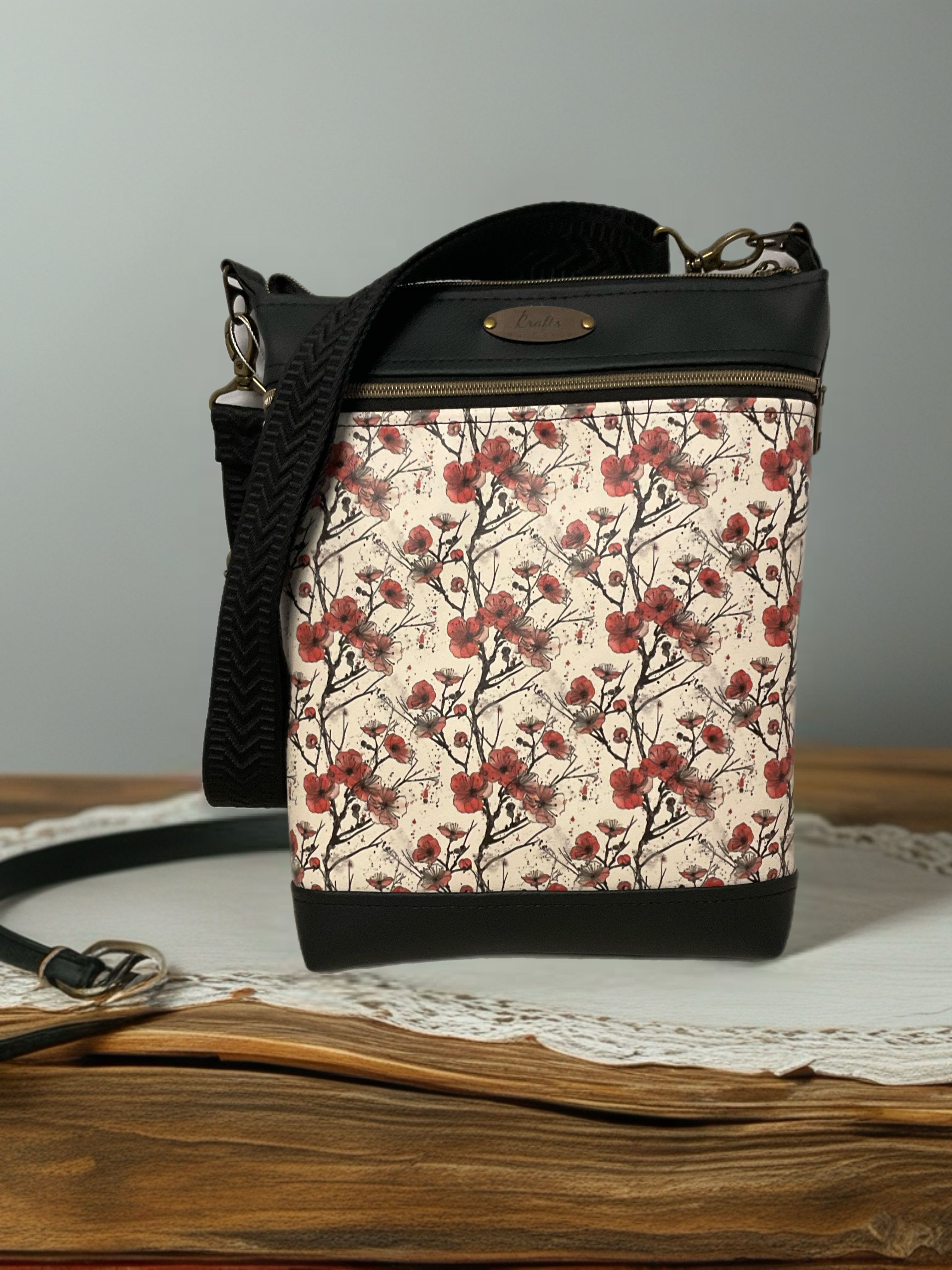 Black bag with poppy print 