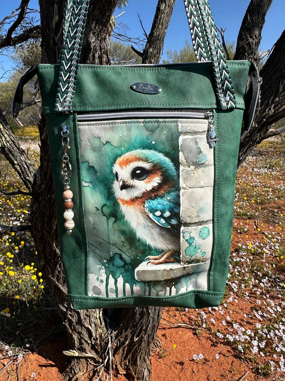 Green bag with owl print