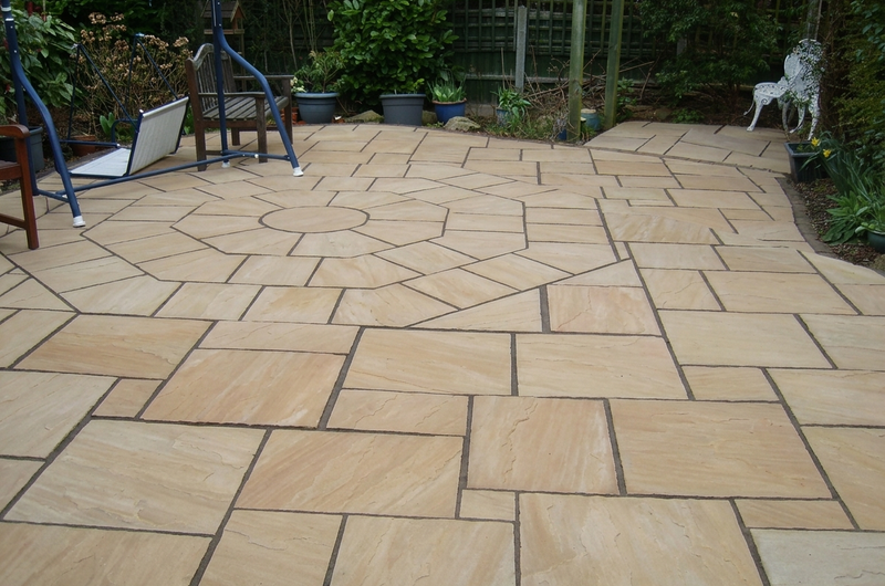Large flagged patio, after