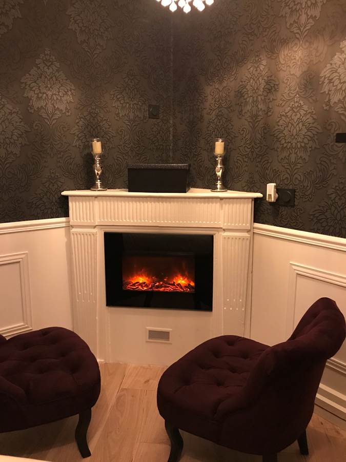 Coin cheminée - Suite Lovin'Room - Résidence du Pélican