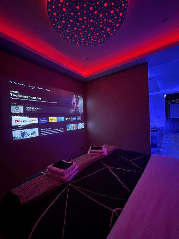 Chambre Home Cinema - Appartement Deluxe by XELA