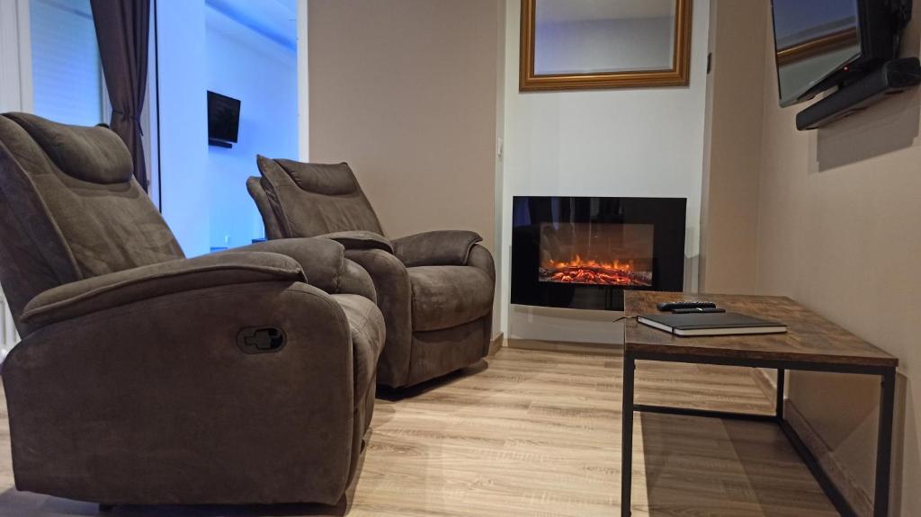 Salon avec Fauteuils relax - Appartement Deluxe by XELA